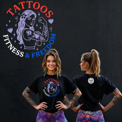 Young woman wearing a black tattoo-themed fitness shirt, showcasing fitness and freedom, with colorful leggings.
