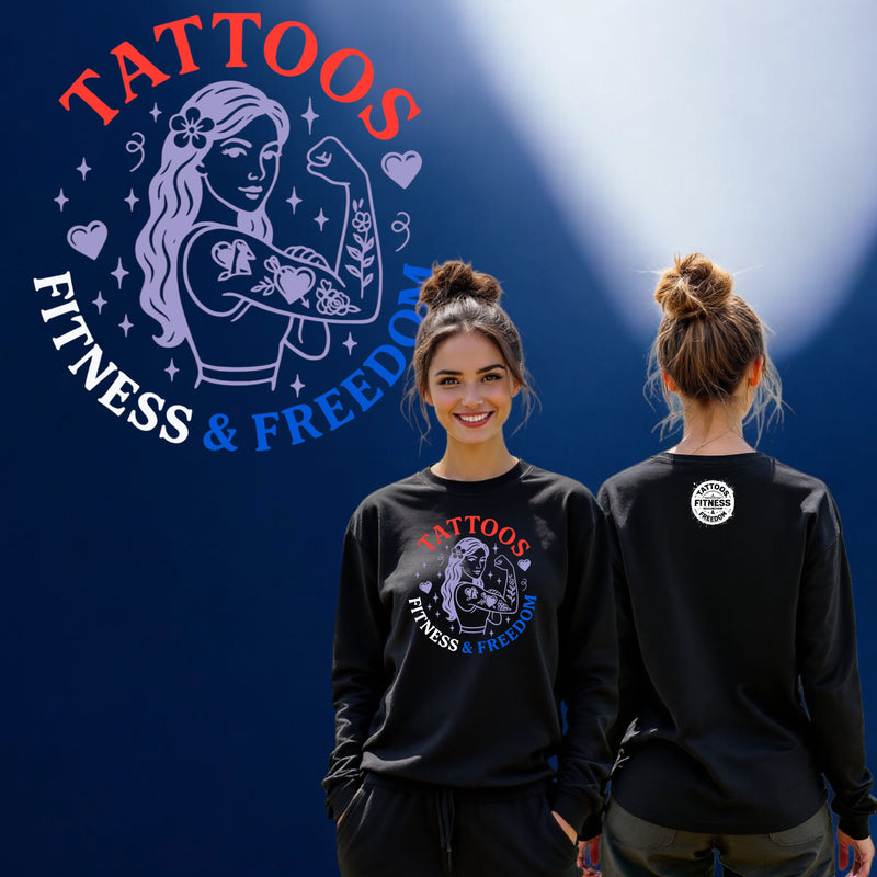 Model wearing a black sweatshirt featuring tattoo art and the text 'Tattoos Fitness & Freedom'.